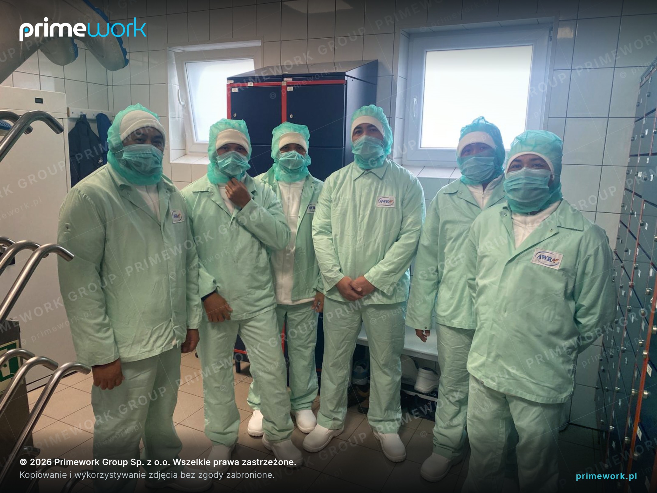 Workers from Asia in the clean zone of a food processing plant in Bulgaria